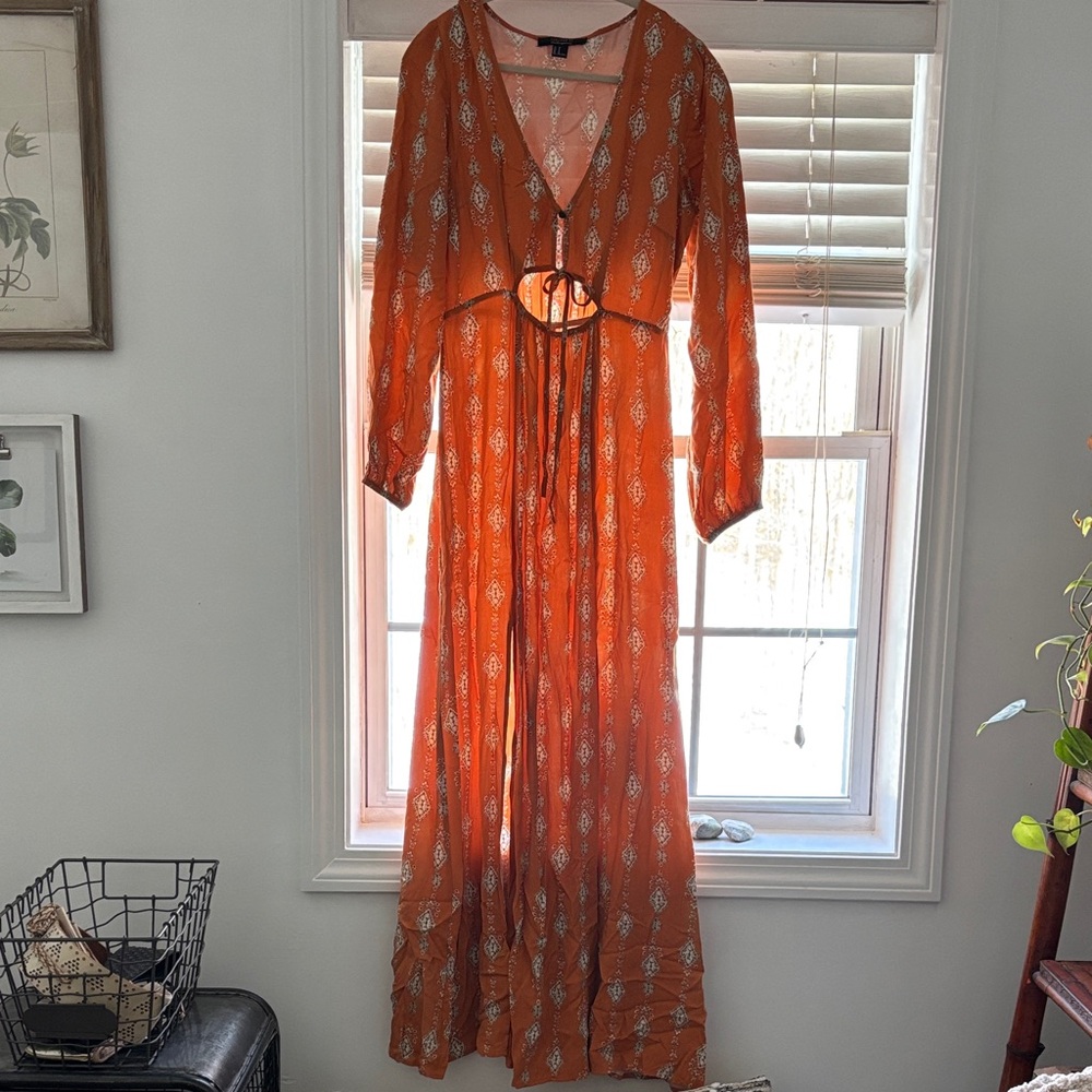 Elegant Orange Maxi Dress with Bohemian Flair